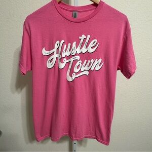 Women's Size Medium 100% Cotton Pink T-Shirt with White "Hustle Town" Graphic
